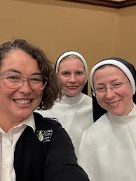 Sr. Annie Killian, OP, a Temporary Professed sister and Assistant Professor  of English at Ohio Dominican University, felt called to the DSOP after  spending an evening in community at the House of