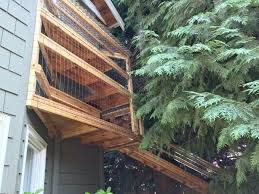 Regulate a cats enclosure use with a custom cat door that sits against a window. Awesome Large Diy Backyard Cat Enclosure Cuckoo4design