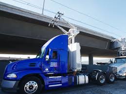 Maintenance worker driving a lorry with tools and equipment a maintenance worker drives a lorry containing tools and equipment to buildings where they will work for a full day maintaining plant and other building services. Tesla S Electric Truck Is Coming And So Are Everyone Else S Wired