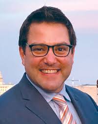 NPR, APMG target executive pay in first rounds of budget cuts