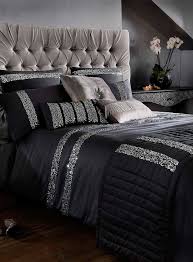 Black And Silver Bedding And Curtains This Sophisticated Black Satin Effect Bed Linen From Kylie Features Silver Sequin Stripes To Add A Sparkling Touch To Your Bed Home Luxury Bedding Home Bedroom