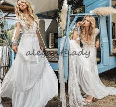 I especially love this crochet wedding dress sold on etsy by lecrochetart. Discountvintage Crochet Lace Bohemian Beach Wedding Dresses Inbal Raviv Short Sleeve V Neck Flowing Flare Summer Holiday Bridal Dress From Alegant Lady 141 31 Bohemian Beach Wedding Dress Casual Wedding Dress Wedding Dresses Uk