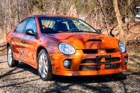 Dodge neon is a practical, inexpensive car with a roomy interior. 2005 Dodge Neon Srt 4 Has Just 2 900 Miles Rare Orange Blast Paint Carscoops