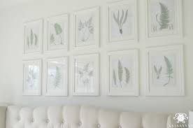 How to hang art on a staircase wall. Easiest Way To Hang A Level Gallery Wall