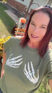 Spooky season skeleton hands shirts available