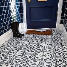 Black And White Patterned Floor Tiles Uk Weather The Storms With This Gorgeous Mudroom The Glossy Blue Tile Coupled With The Patterned Black An Patterned Floor Tiles Tile Floor Hallway Tiles Floor