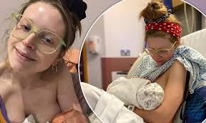Harry Potter star Jessie Cave breastfeeds newborn son Abraham Benjamin in  sweet snap