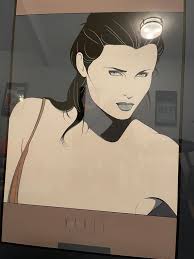 Patrick Nagel Serigraph NC14 Woman With Longer Black Hair and Tan Strap  Over Her Right Shoulder.