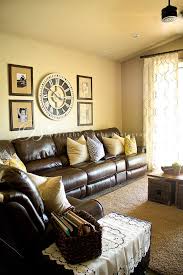 A cream accent chair adds light yellow to the space, while mustard and olive curtains add depth to the scheme. 10 Curtain On Yellow Walls Ideas Yellow Walls Home Yellow Living Room