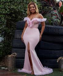Let Joselyn Dumas Get You In That Wedding Guest Groove With These Pink Dresses For More Use T Wedding Guest Outfit Mermaid Bridesmaid Dresses Lace Gown Styles