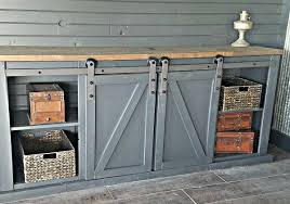 Build a tv stand tv stand plans diy tv stand x console tv stand console table barn door tv stand barn door tv cabinet tv stand with doors barn door media console. Remodelaholic How To Build A Sliding Barn Door Entertainment Center For Your Man Cave