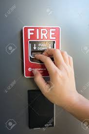 When someone pulls the fire alarm, we're going to handcuff them to that very spot. The Hand Of Woman Is Pulling Fire Alarm On The Wall Next To The Stock Photo Picture And Royalty Free Image Image 85071402