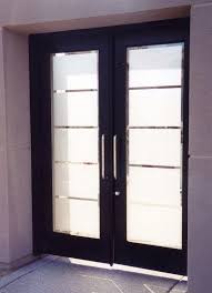 This beautiful glass garage doors features an anodized bronze frame with frosted satin etched glass. Glass Doors Frosted Glass Front Entry Doors Grand Frosted Eclectic Entrance Other By Sans Soucie Art Glass Houzz Ie