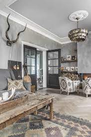 Paired with deep wood tones and golds, a brooding color like behr's peruvian violet can round out a rustic color palette with style. 50 Rustic Living Room Ideas To Fashion Your Revamp Around