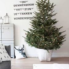 Indoor decorations often begin with an evergreen tree that is decorated with lights, ornaments, and a star. Holiday Decorating Ideas An Interior Designer S Guide To Festive Decor