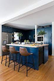 Took me about 2 hours. Blue Kitchen Cabinets With Blue Island Transitional Kitchen