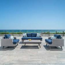 Portofino Casual 4 Piece Seating Set In Laguna Blue Resin Patio Furniture Patio Furniture Cushions Small Patio Furniture