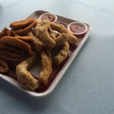 Pisang goreng ('fried banana' in indonesian/malay) is a fritter made by deep frying battered plantain in hot oil. Photos At Pisang Goreng Rangup Inspen