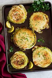 Put the cabbage leaves or shredded cabbage in a large pan and cover halfway with water. Roasted Cabbage Steaks Cooking Classy