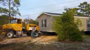 What It S Like To Have A Mobile Home Moved Mobile Home House Movers Manufactured Home