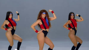 We're pushing the envelope as far as. Shakira Strips To 1980s Style Workout Gear As She Joins The Black Eyed Peas In The Music Video For Girl Like Me