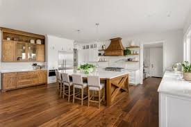 Natural wood floors in the kitchen can last a while with the right treatment [from: 7 Hickory Cabinets With Dark Wood Floors Ideas To Create A Stun Jimenezphoto