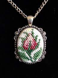Hand Made Cross Stitch Flower Necklace With Oval Silver Tone Etsy Cross Stitch Necklace Cross Stitch Cross Stitch Patterns