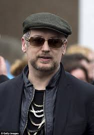 Boy George and Martin and Gary Kemp carry coffin at Steve Strange funeral