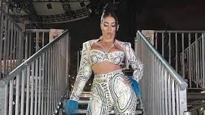 Kali uchis has the om symbol tattooed on her left hand middle finger knuckle. Kali Uchis S Custom Selena Inspired Stage Outfit Is As Political As Fashion Statements Get Vogue