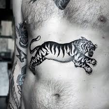 Top 103 Best Stomach Tattoos Ideas 2020 Inspiration Guide Stomach Tattoos Tiger Tattoo Traditional Tiger Tattoo