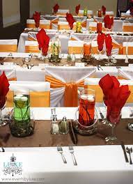 Orange White Brown And Red Wedding Decor In London Ontario Fall Wedding Centerpieces Red Wedding Decorations Orange Centerpieces