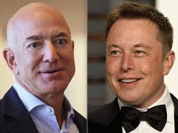 Bezos Says 'Batten Down' Hatches. Tesla Is Pedal to the Metal.