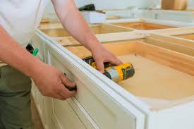 Premium Photo Close Up Of Handyman Install Door In New Apartment With Equipment