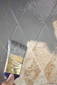 See more ideas about painting tile backsplash, painting tile, backsplash. Paint Tile Backsplash With Oil Based Paint For An Easy Update Paint Tile Backsplash Painting Kitchen Tiles Home Diy