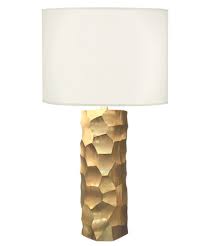 Crafted from metal, this lamp's base strikes a tapered, geometric silhouette in a brushed gold finish, working well in any contemporary setting. Daphne Table Lamp Brushed Gold Lamp Table Lamp Gold Desk Lamps