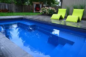 Get in touch today to learn more about our pool company. Sweet Little 8 X 16 Fibreglass Pool And Patio Landscape Design By Melanie Rekola Pool By Blue Diamond Pools Pool Landscaping Patio Landscaping Patio Design
