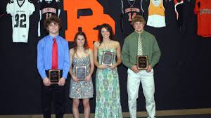 Carlson, Haugland receive top honors