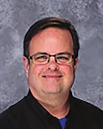 Lifer' to end teaching, administrative career