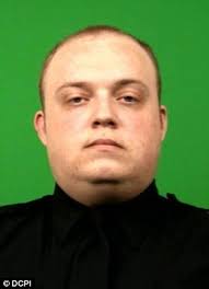NYPD officer Brian Groves's vest saves him from gunman's bullet to the  heart