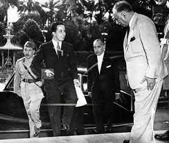 الباشا نوري السعيد بأستقبال الملك فيصل الثاني قاعة بهو الأمانه historical news history baghdad