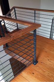 Wood and metal stair landing railing. Pin On Stairs Stair Railings