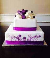 Two Tier Purple Gold White Simple Wedding Cake With Damask Stencilling And Fondant Bows Created By Corteztreats