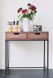 A Decorated Entryway Table Adds A Warm Inviting Accent Console Table Decor Home