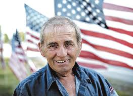 ILLINOIS 'FLAGMAN' VOWS TO BEAT CANCER