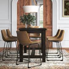 Tuck a round table with a pedestal base into a corner for a snug eating area. Joss Main 6 Person Counter Height Dining Set Reviews Wayfair