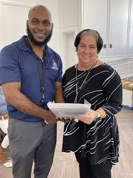 Cayman: MIISD demonstrates commitment to innovating social development by  providing over 50 tablets to Department of Children and Family Services  (DCFS)