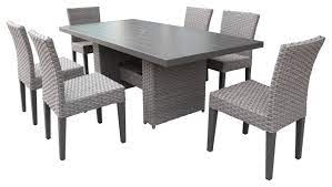 Marble dining room table top with stand peacock inlay marquetry stone decor e434. Monterey Rectangular Patio Dining Table 6 Armless Chairs Grey Stone Tropical Outdoor Dining Sets By Tk Classics Houzz