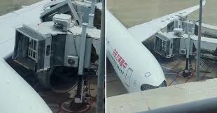 Passenger jet crashes into bridge at airport terminal