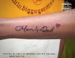 Mom Dad With Heartbeat Tattoo Mumbaitattoocolaba Bigguystattoo Nametattoo Momdad Calligraphytattoo Inke Mom Dad Tattoos Dad Tattoos Heartbeat Tattoo