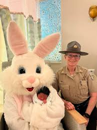 Each year, Sheriff Dickerson looks forward to one of her favorite Easter  traditions—escorting the Easter Bunny! This Easter morning was no different  as she joined the bunny in spreading smiles and holiday